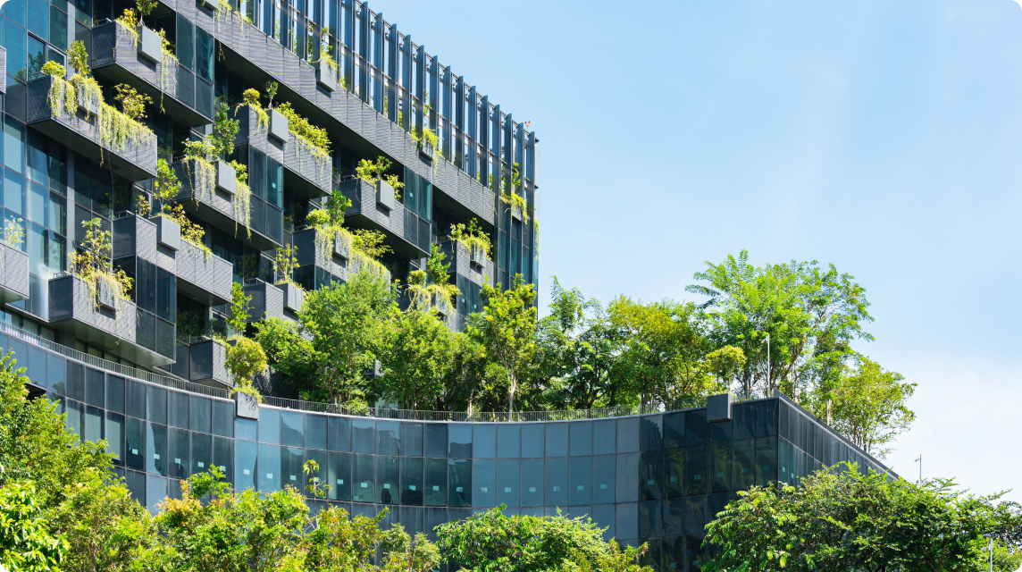 A building with trees growing on the top
